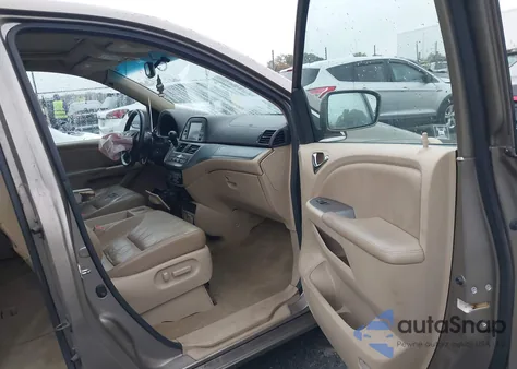 2010 Honda Odyssey Ex-L z USA, uszkodzony, nr VIN 5FNRL3H74AB055796